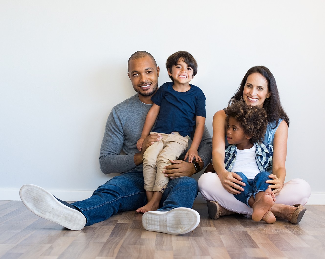 bigstock-Happy-multiethnic-family-sitti-197376061