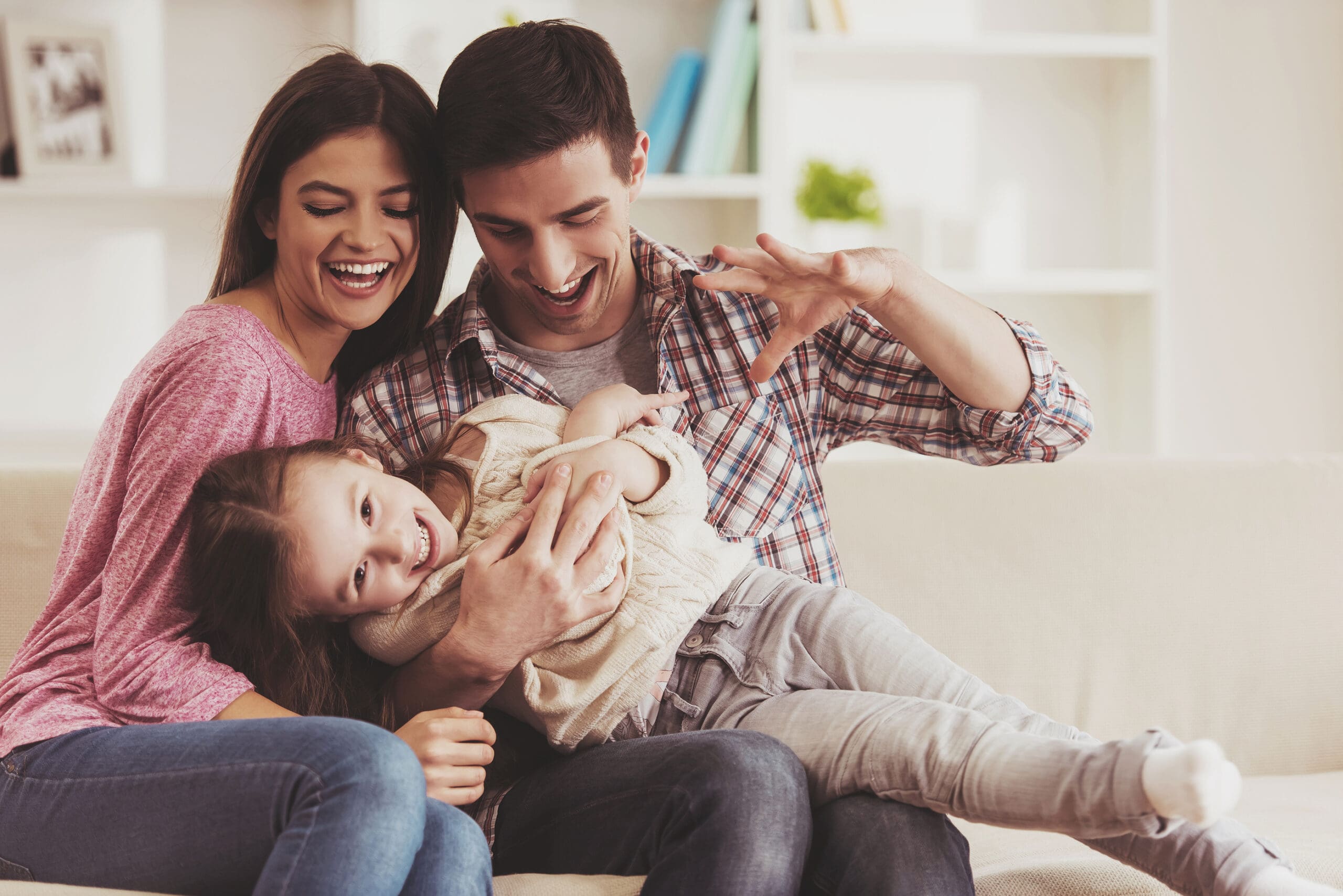 Young Family Having Fun. Together At Home. Happy Childhood. Attr A woman looking for an adoption agency in jackson tn